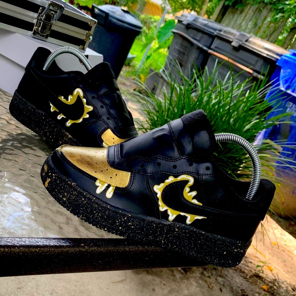 Black & gold nikes with a DrIp